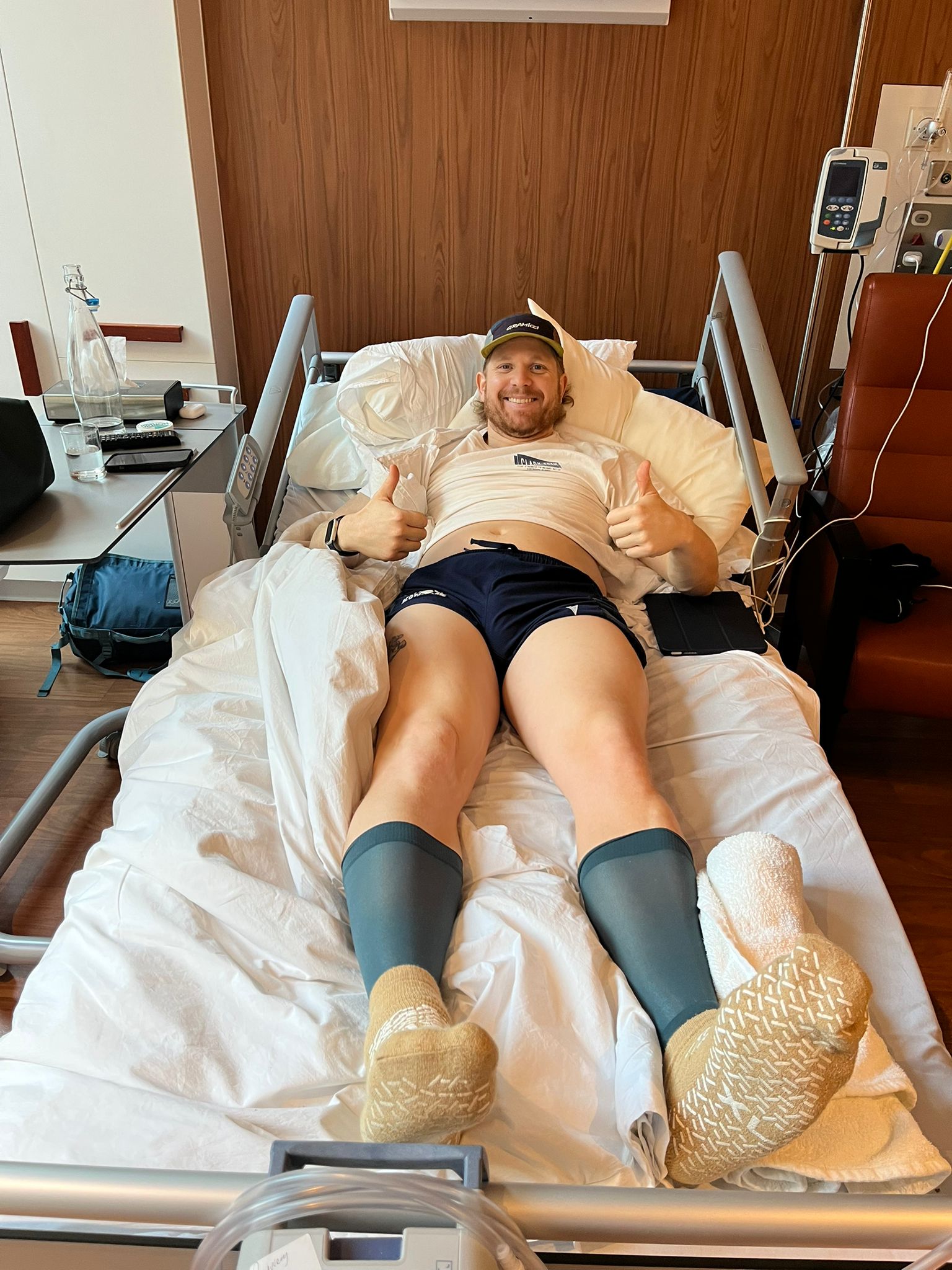 Scott Angus recovering in hospital after a complex hip replacement, February 2026